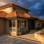 Sydney residential home with dramatic storm clouds approaching - La Niña storm preparation guide 2026
