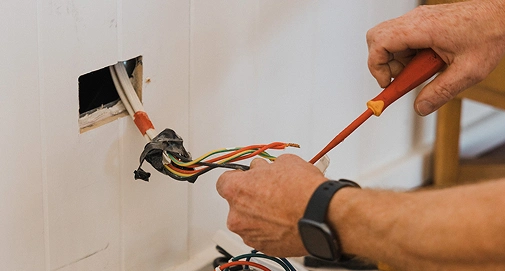Licensed electrician completing electrical safety inspection in Sydney property